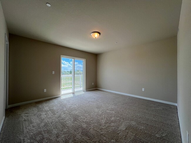 Building Photo - Brand New Townhome with fine finishes ready for you to enjoy. Great views!
