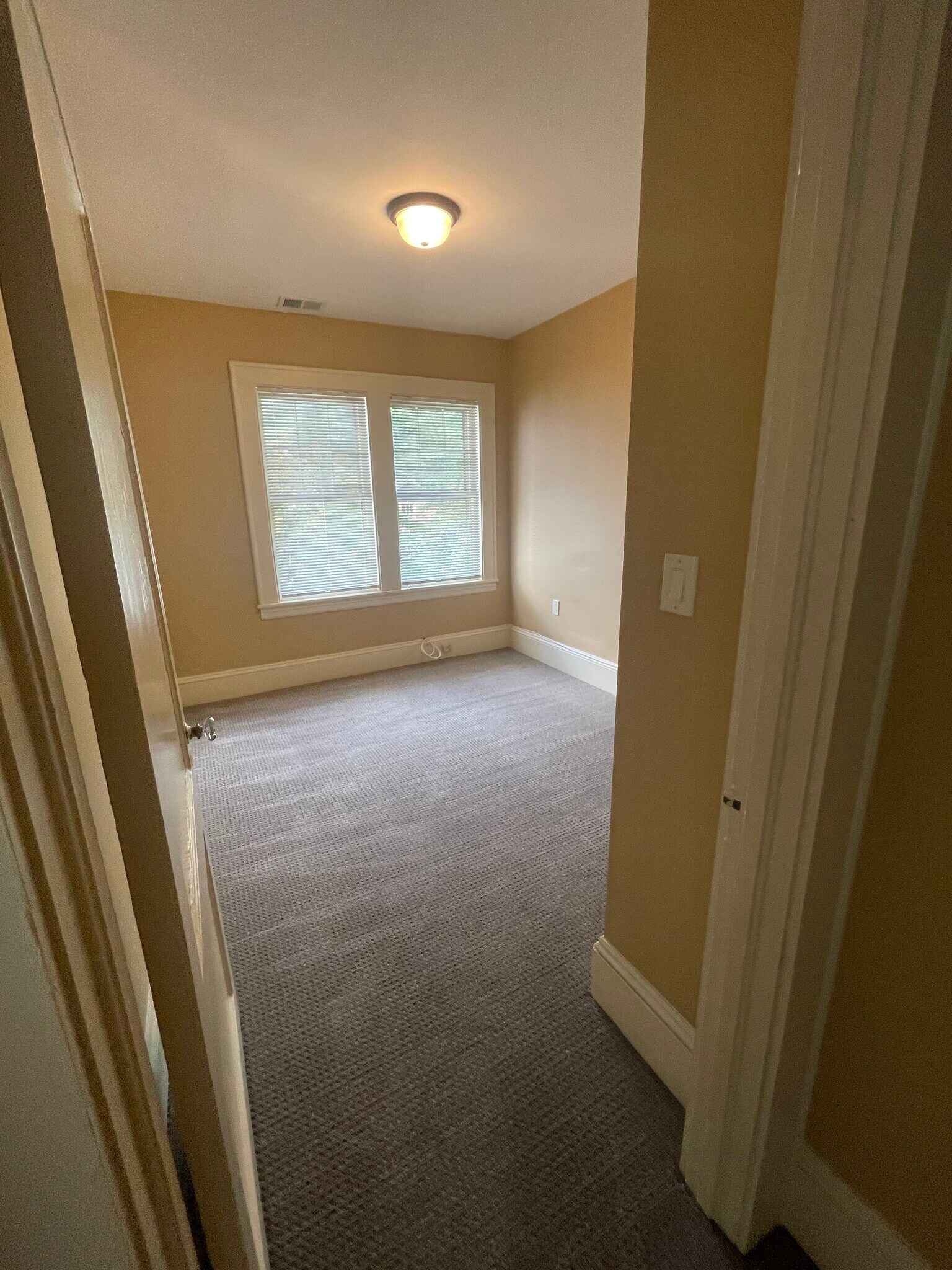 smaller second bedroom with new carpet - 418 Clement Ave