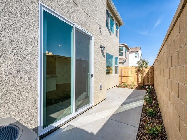Building Photo - NEW! Modern, Wilson Home. 3 bedrooms / 2.5-bathroom single-family home in a quiet gated community...