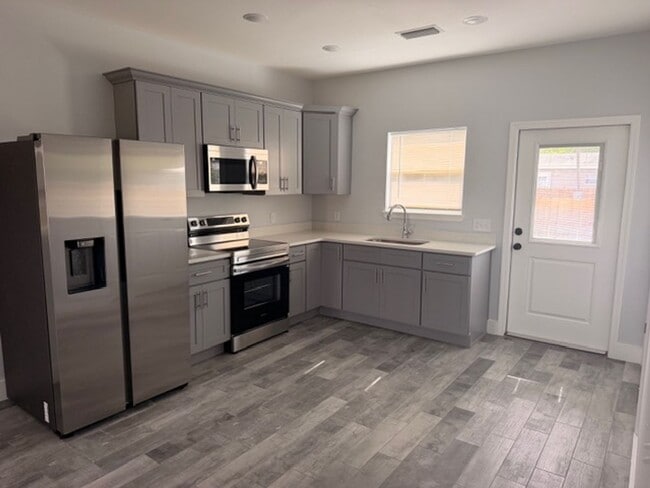 Building Photo - Orlando Rd Duplexes