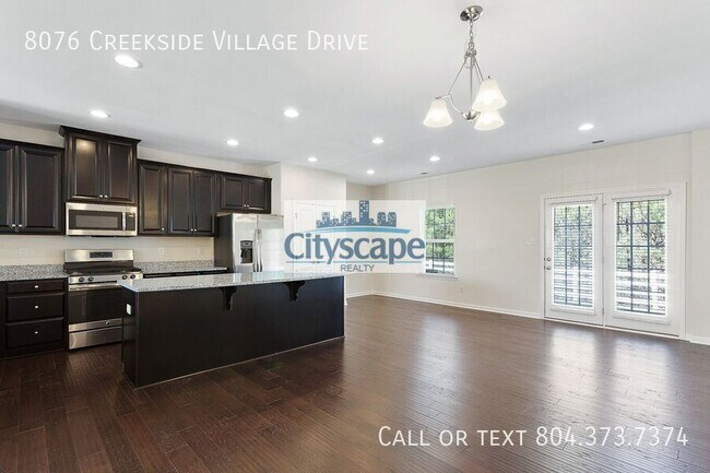 Building Photo - 8076 Creekside Village Dr