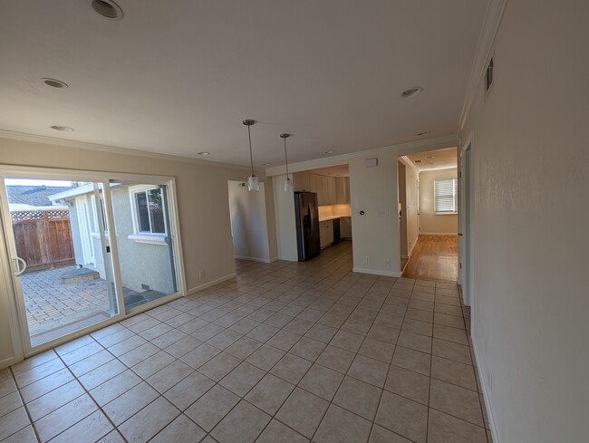 View from bedroom hallways into dining, kitchen, and living rooms. - 1533 Santa Monica Ave