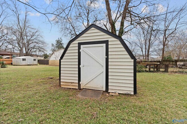 Building Photo - 1306 Oshaughnessy Ave NE