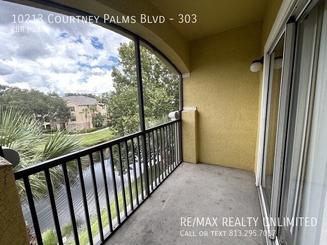 Building Photo - 10213 Courtney Palms Blvd