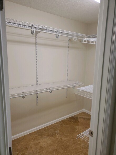 Wall to Wall Racks and Shelves - 25116 Plantation Dr NE