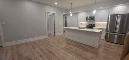 Building Photo - Get $1,000 on closing! NO FEE BRAND NEW LUXURY CONSTRUCTION, LAUNDRY IN UNIT, PARKING INCLUDED