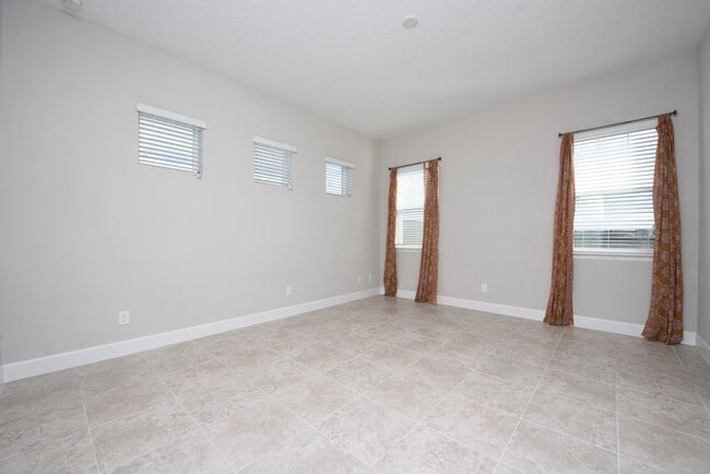 Building Photo - Modern 2 bedroom, 2 bath Townhouse with Bonus Room in the Laureate Park Community of Lake Nona.