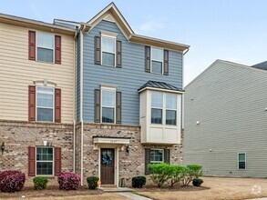 Building Photo - Beautiful townhome in a super cute Community!