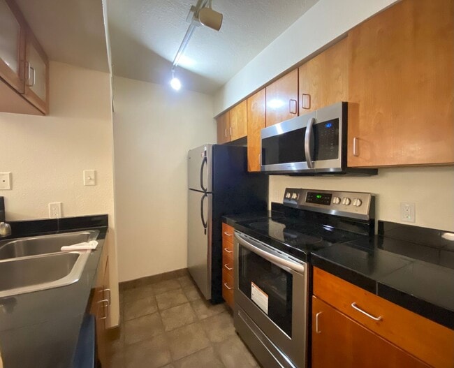 Building Photo - Beautiful Two-Bedroom Condo at The Reserve