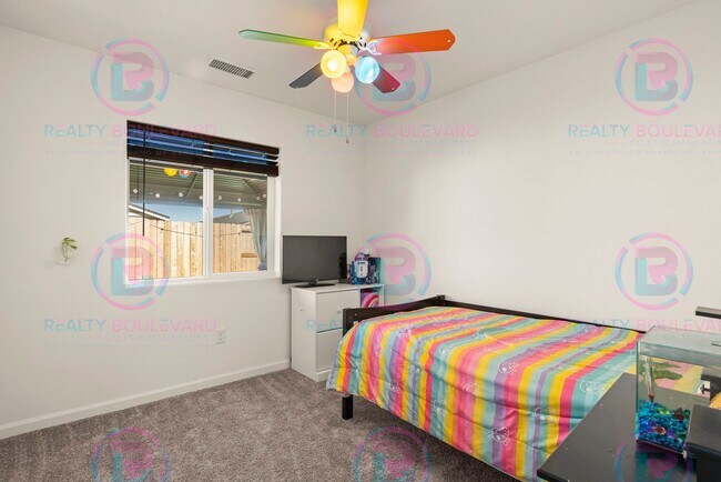 Building Photo - Spacious 4-Bedroom Lemon Valley Home with ...
