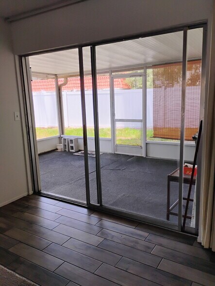 Screened lanai back door utility rm here - 2831 Swifton Dr