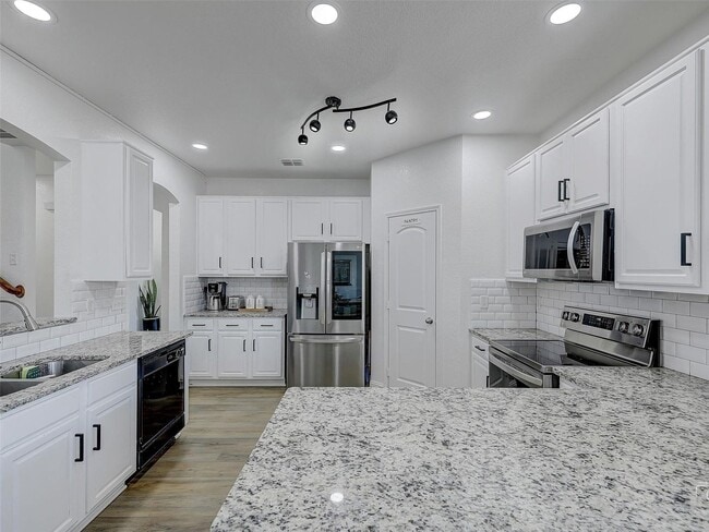 Building Photo - (1 Month Free with 16-Month Lease) Updated 3BR/2.5BA Home with Fireplace & Open Layout