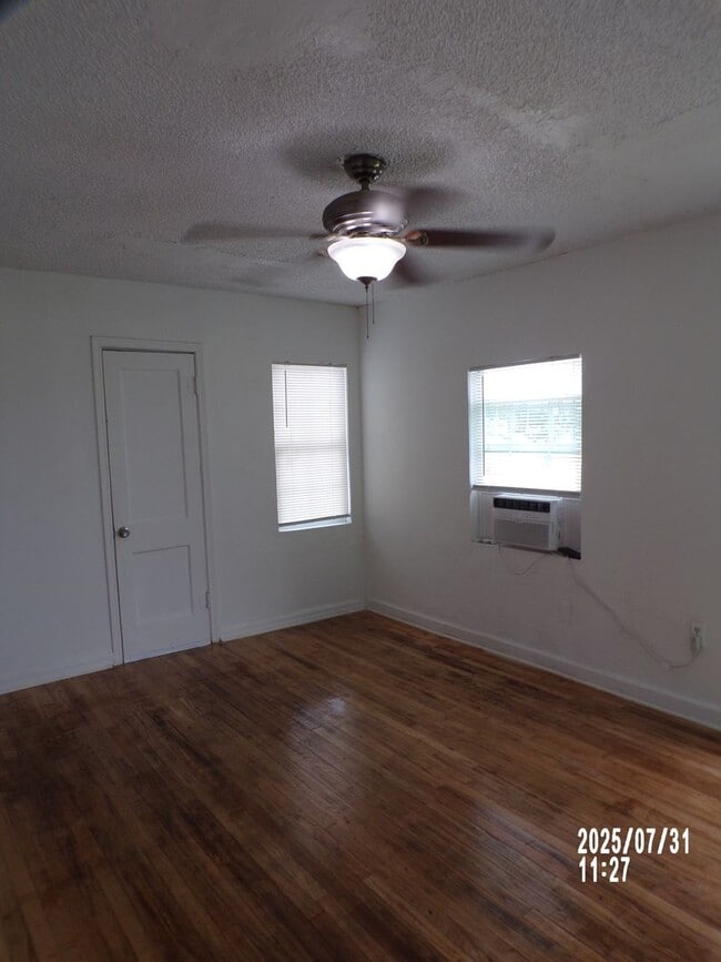Building Photo - NEW listing-refinished hardwood floors, new laminate and paint throughout