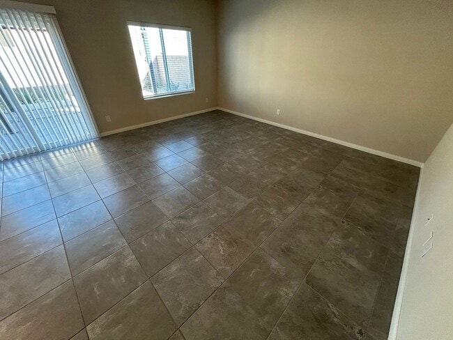 Building Photo - Gorgeous two-story home with 5 bedrooms and 3 bathrooms in a gated community