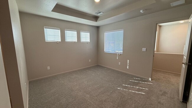 Building Photo - Light and airy 3-bed, 3-bath townhome in one of the area’s most highly desired Red Hawk area.