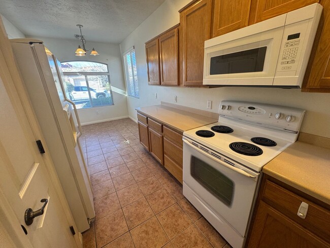 Building Photo - Coral Canyon Gem with NEW CARPET & TWO CAR...