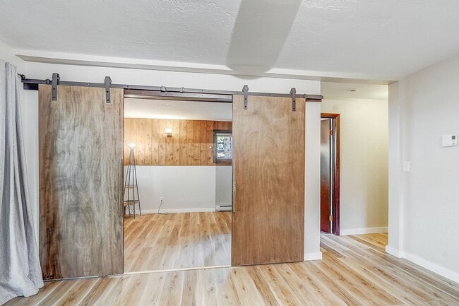 Building Photo - Cabin in the woods!  Fenced Yard!  Year le...