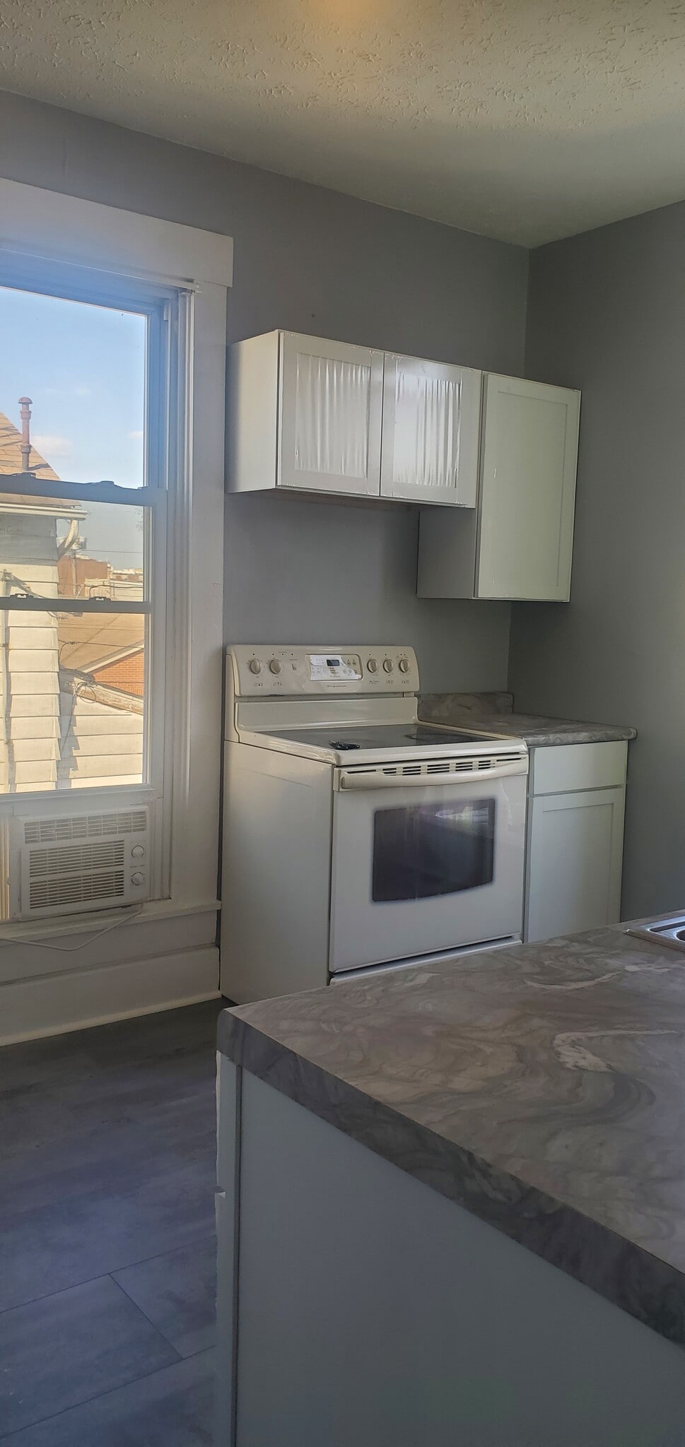 Stove, refrig and ac unit included - 131 S 7th St