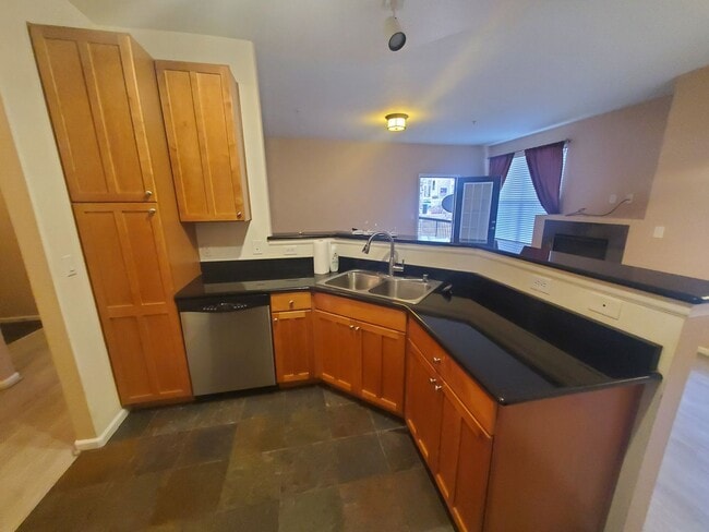 Building Photo - Spacious 2B/2B Main Level Condo With Garage NOW AVAILABLE