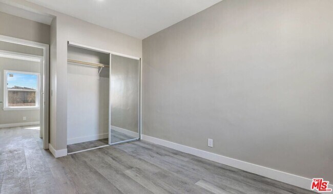 Building Photo - 9217 Langdon Ave