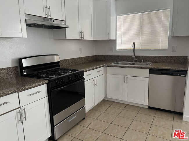 Building Photo - 6640 Irvine Ave