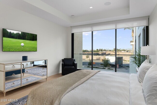 Building Photo - 6587 N Palmeraie Blvd