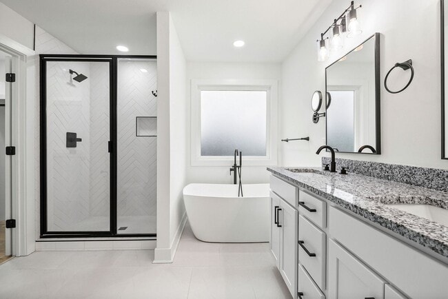 Building Photo - Pet Friendly Three Bedroom with Bonus!