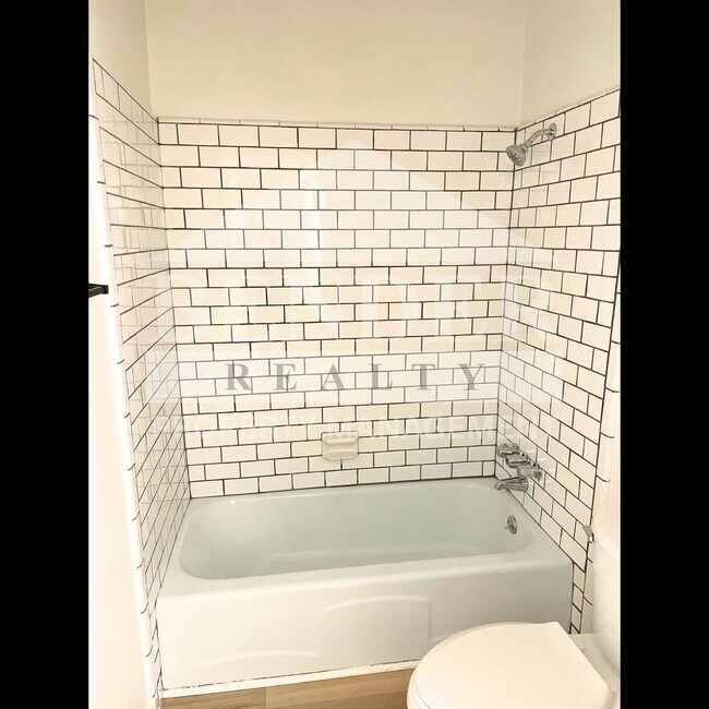 Building Photo - DUPLEX IN THE CITY