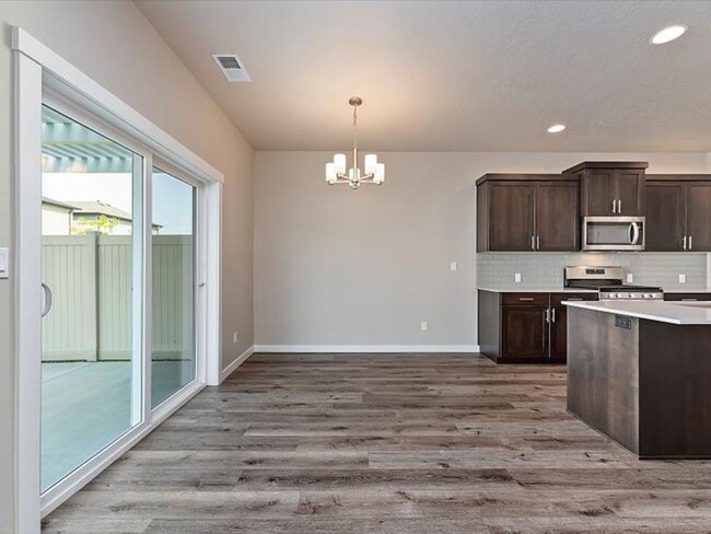Building Photo - Must See!  Ready to move in! 4 bedroom, 2 bath home available in Verado with landscaping Included!