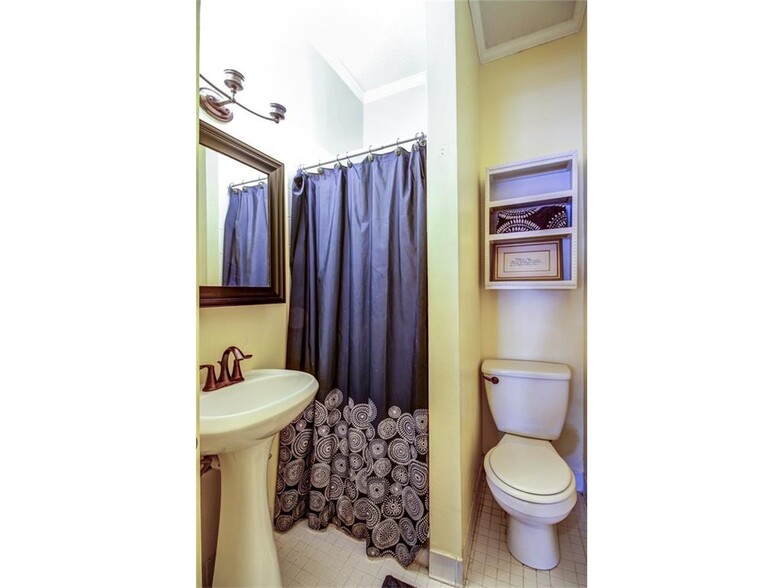 2nd Bath with Shower currently has pastel blue paint color - 182 2nd Avenue Southeast