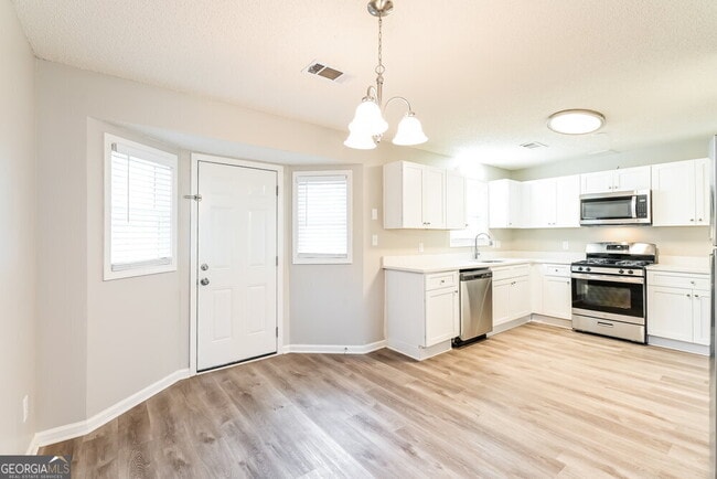 Building Photo - 5767 Riverside Dr
