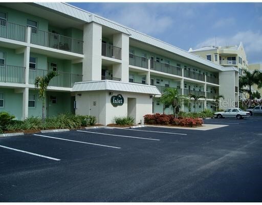 exterior building unit #10 ground floor end unit - 9200 Midnight Pass Rd