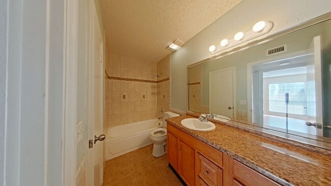 Building Photo - Bright Pool-View Condo with Private Balcony & Open Living Spaces