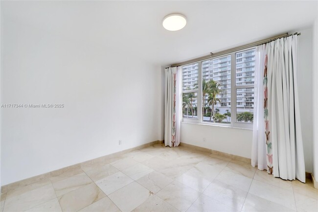 Building Photo - 5600 Collins Ave