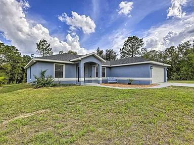 Building Photo - Peaceful Backyard Views! 3BR Home on Nearly Half an Acre with Screened Porch