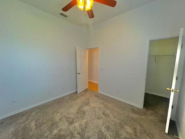 Building Photo - Spacious 4-Bed, 3-Bath Home in Guard-Gated...