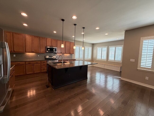 Building Photo - "Luxurious 5-Bedroom Haven in Broomfield with Stunning Granite Finishes & Cozy Fireplace!"