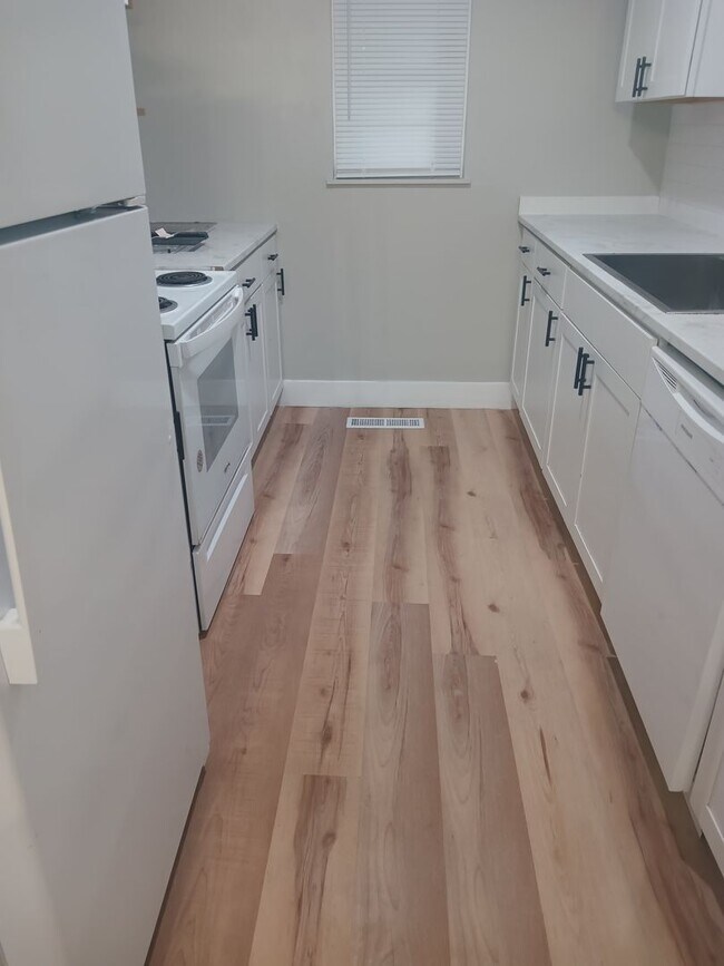 Building Photo - Welcome to Your Next Home with Harvest Inv...