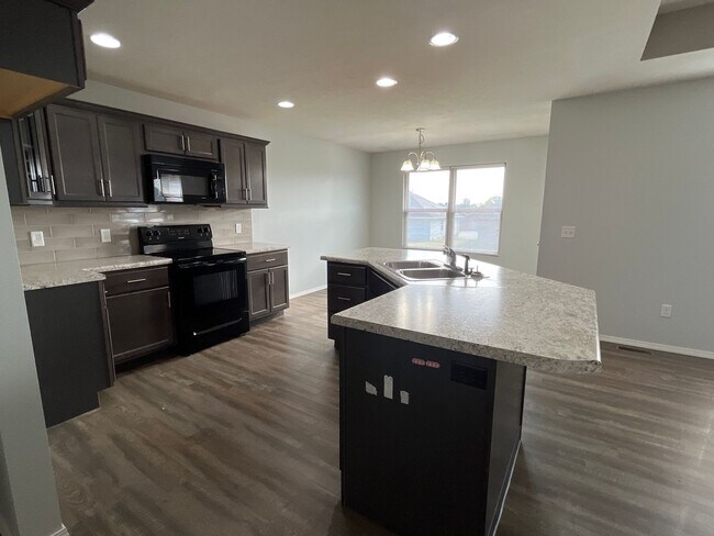Building Photo - Sit Back, Relax. Your New home Awaits in R...