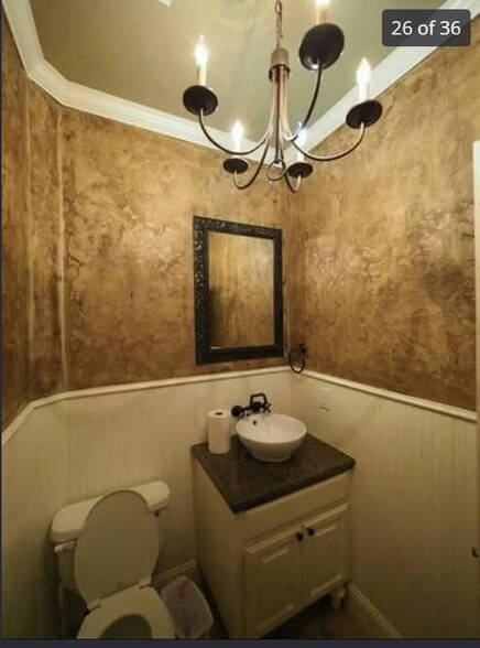 restroom near kitchen and living room - 4413 Spyglass Dr