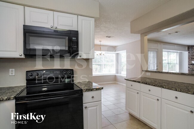 Building Photo - 24106 Creekview Dr