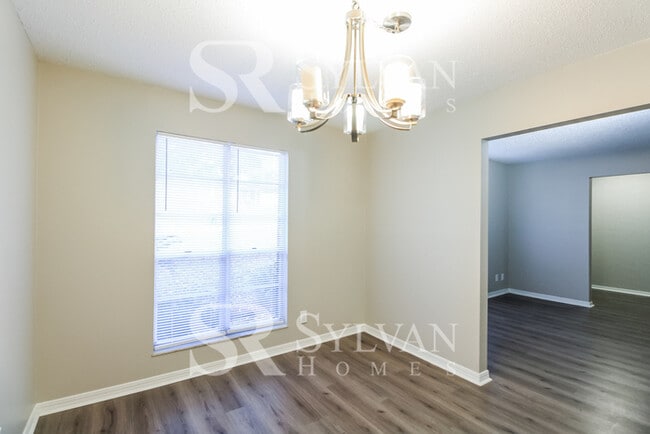 Building Photo - The ideal space to balance life, work, and play.