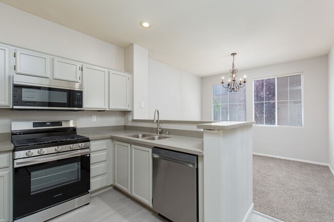 Building Photo - NW townhome with 2 car garage in gated community.
