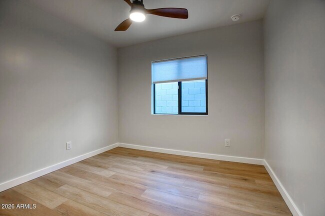 Building Photo - 8015 W Roma Ave