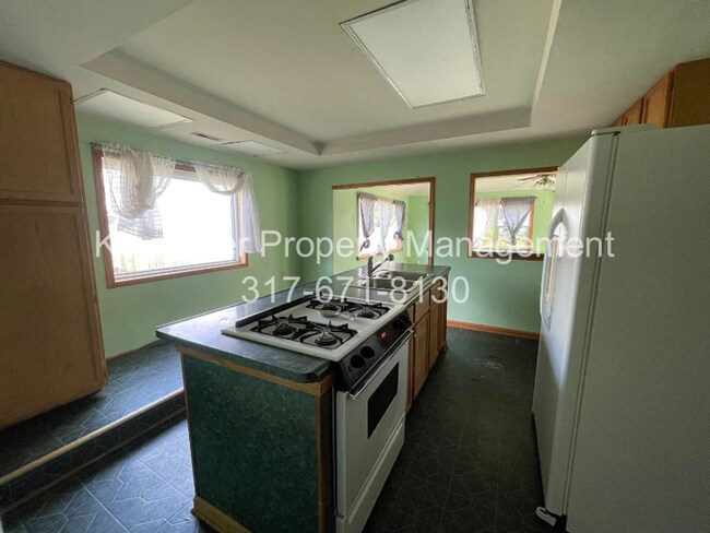 Building Photo - Cozy 3BR/2BA Home with Deck & Yard – Great Greenfield Location