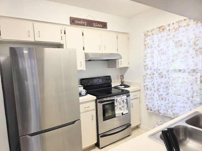 Building Photo - Reduced!!! Charming 1-bedroom, 1-bath second-floor condo available NOW!