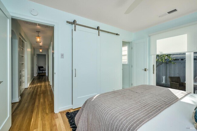 Master bedroom closet with barn door - 163 California Ave