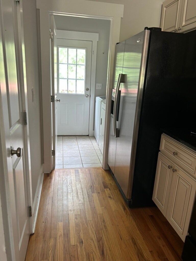 Kitchen toward the laundry room and back door (current photo) - 144 Estelle Park Dr