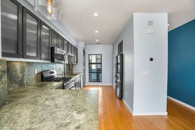 Building Photo - Townhome with EV Ready Garage!