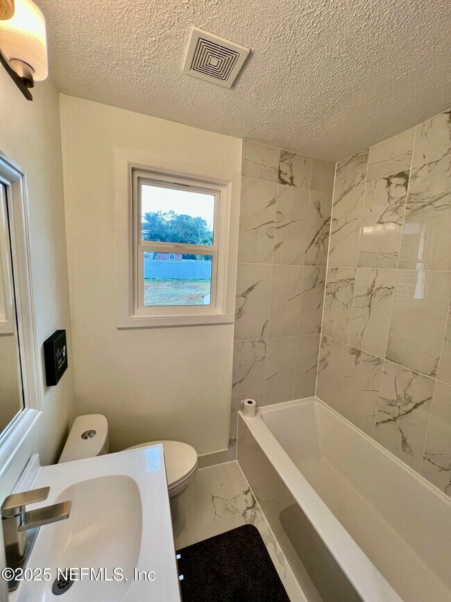 Building Photo - 9720 Jupiter Ct S
